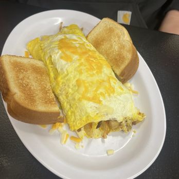 Woodees - Woodees Omelet 3 egg omelet "stuffed with hashbrowns, sausage, onions, mushrooms, and Swiss cheese with toast" - American Near Me - Lincoln, Nebraska Woodees - Woodees Omelet 3 egg omelet "stuffed with hashbrowns, sausage, onions, mushrooms, and Swiss cheese with toast" - American Near Me - Lincoln, Nebraska