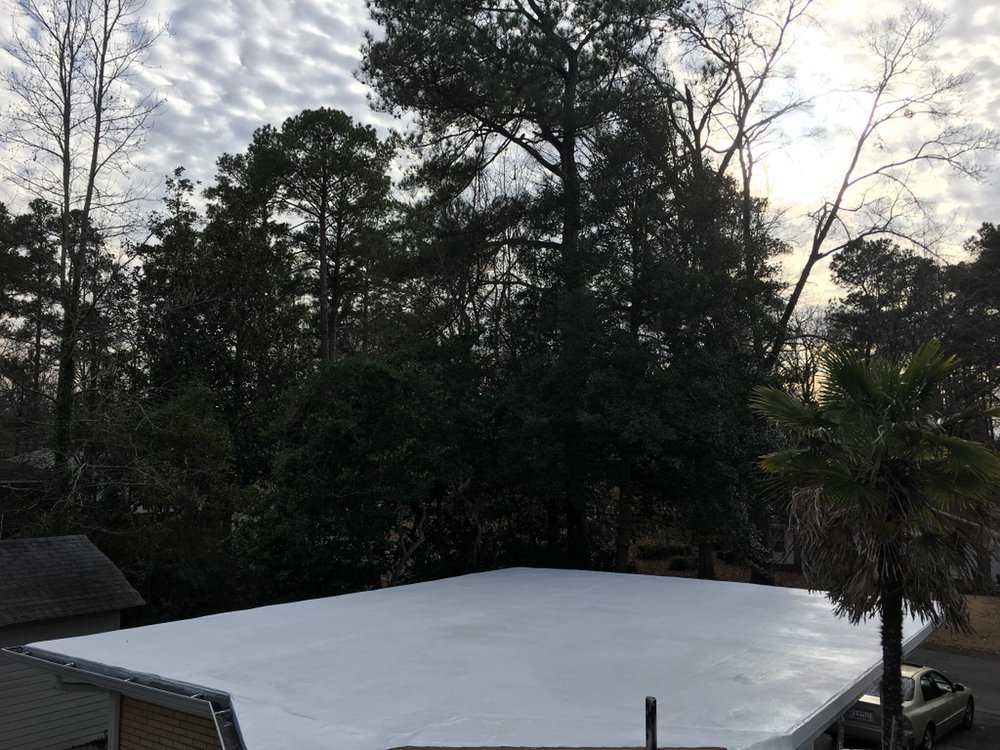 Slide of Patch Adams Roofing