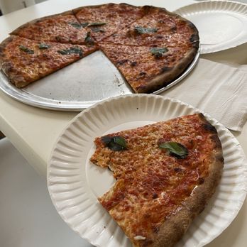 Nico's Charred Pies - a slice missing - Pizza Near Me - Copiague, New York