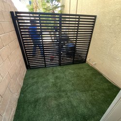 Custom Steelworks - Side yard dog enclosure with gate.