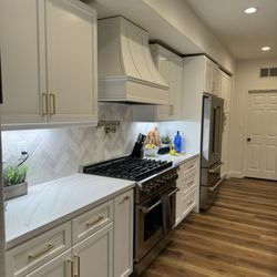 The Shine Stone - Wall cabinet countertops. Cambria Everleigh Quartz.
