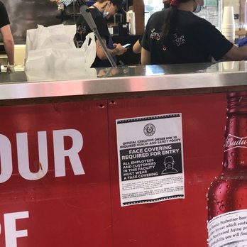 Longhorn Cafe - No mask in the food prep area and face down over the condiments. Boooooooooo - Burgers Near Me - San Antonio, Texas