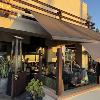 Reunion Kitchen + Drink - Outdoor eating area. - New American Near Me - Anaheim, California Reunion Kitchen + Drink - Outdoor eating area. - New American Near Me - Anaheim, California