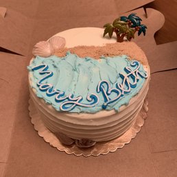 Beach themed red velvet cake with cream cheese frosting and graham cracker sand Beach themed red velvet cake with cream cheese frosting and graham cracker sand