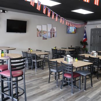 La Jibarita - tables and chairs in a restaurant - Puerto Rican Near Me - Clermont, Florida La Jibarita - tables and chairs in a restaurant - Puerto Rican Near Me - Clermont, Florida