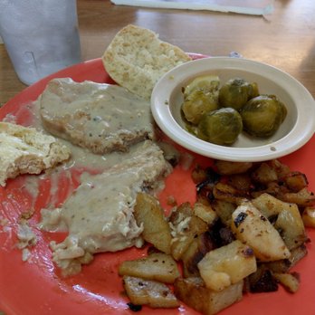 Memes D.O.C. Cafe - Sorry about the messy picture. I was so hungry I forgot to take it before I started! Smothered pork chops. - Breakfast & Brunch Near Me - Amarillo, Texas