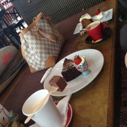 Two Birds Gallery Cafe - Blackbird hot chocolate spoon date cake capachino and carrot cake :)