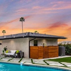 AquaDestiny Pools - Simple and modern fully out with concrete tile and Astroturf accent.