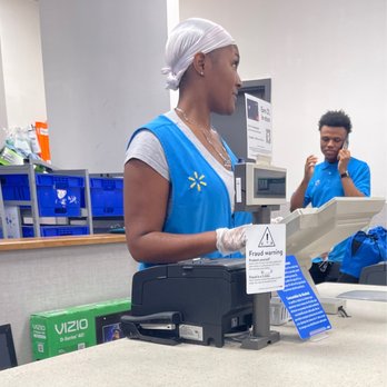 Walmart Supercenter - a woman standing at a cash register - Department Stores Near Me - Katy, Texas Walmart Supercenter - a woman standing at a cash register - Department Stores Near Me - Katy, Texas