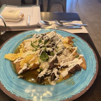 Atticus Cafe - Steak chilaquiles with scrambled eggs - Breakfast & Brunch Near Me - Anaheim, California Atticus Cafe - Steak chilaquiles with scrambled eggs - Breakfast & Brunch Near Me - Anaheim, California