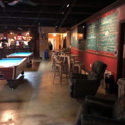Rack N Balls Pub - Lazy boy and tables to chill out