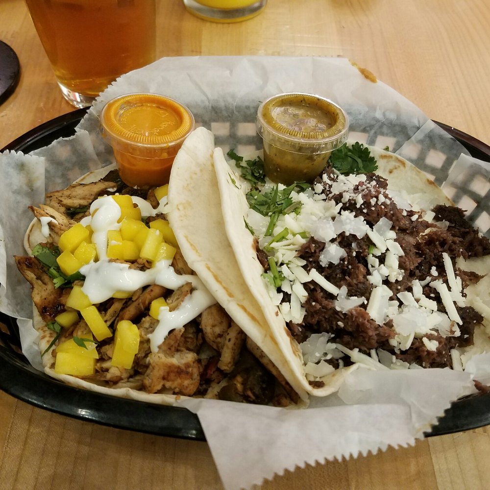 Torchy's Tacos - Brushfire on left (comes with spicy Diablo sauce). The Democrat on right (mild but very flavorful!) - Tex-Mex Near Me - Denver, Colorado Torchy's Tacos - Brushfire on left (comes with spicy Diablo sauce). The Democrat on right (mild but very flavorful!) - Tex-Mex Near Me - Denver, Colorado