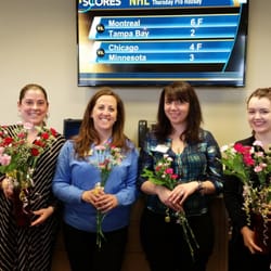 Avidia Bank - The Hudson South Branch tellers handing out flowers to Mothers for Mother's Day!