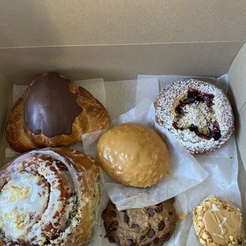 Pavel's Backerei - Chocolate croissant, cinnamon roll, maple something, chocolate chunk cookie, berry cheese danish, and a peanut butter cookie! - Bakeries Near Me - Pacific Grove, California Pavel's Backerei - Chocolate croissant, cinnamon roll, maple something, chocolate chunk cookie, berry cheese danish, and a peanut butter cookie! - Bakeries Near Me - Pacific Grove, California