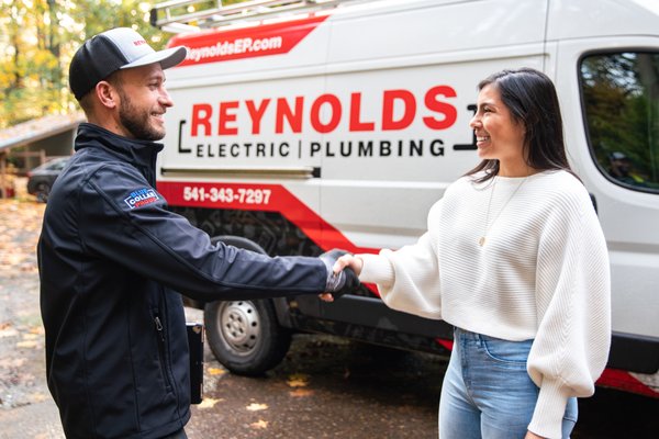 Reynolds Electric and Plumbing Logo