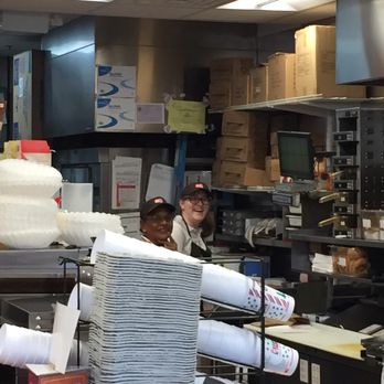 Dunkin' - two women working in a restaurant kitchen - Donuts Near Me - Ellicott City, Maryland Dunkin' - two women working in a restaurant kitchen - Donuts Near Me - Ellicott City, Maryland