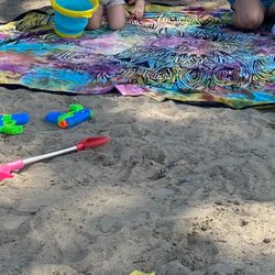 Britannia Park and Beach - Sand by the shaded area under the big tree by the Ron Kolbus Lakeside Centre