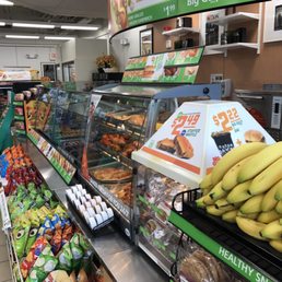 a woman in a grocery store a woman in a grocery store