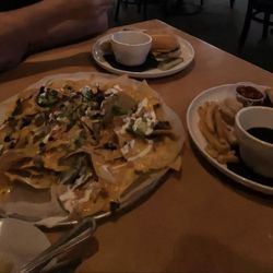 Press Box Sports Grill - Clovis - Look at that enormous steak nachos! Love the natural jalapeño's! And French dip! Loved the roll the dip was made with too!