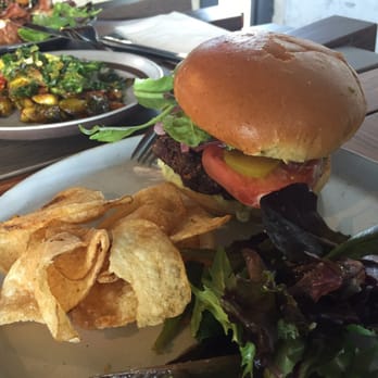 PublicUs - today's special vegan burger, background is VERY spicy garlic brussel sprouts :D - Coffee & Tea Near Me - Las Vegas, Nevada