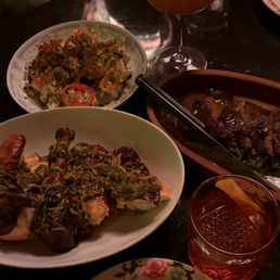 Roasted Chicken, Outside Skirt Steak, Voodoo Cocktail, and After Midnight Cocktail Roasted Chicken, Outside Skirt Steak, Voodoo Cocktail, and After Midnight Cocktail