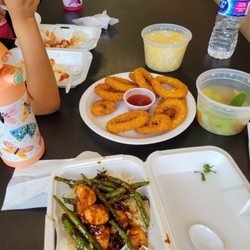 Sweet sour chicken on rice with corn soup, green bean chicken on rice with vegetable soup and fried calamari. $30 for food and soup