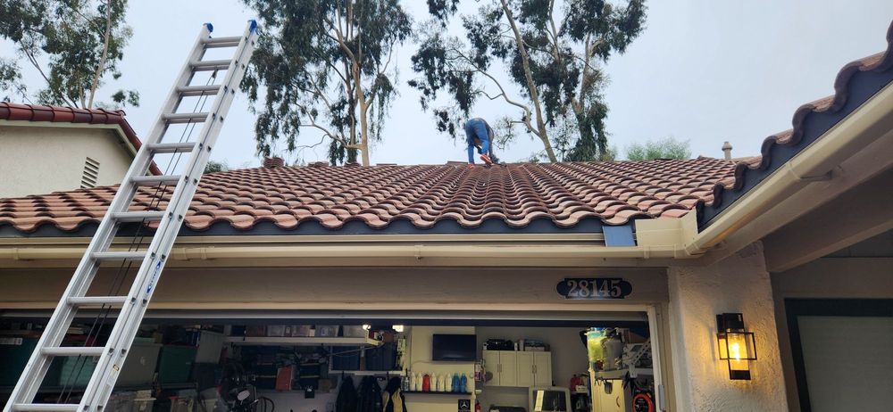 Slide of Henala Roofing