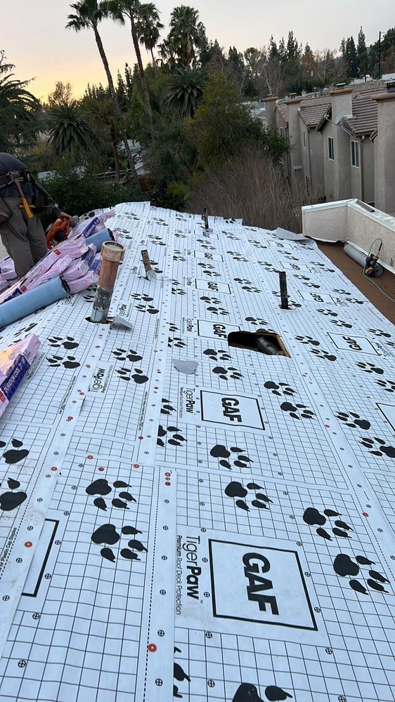 Slide of Alpine Roofing Guys