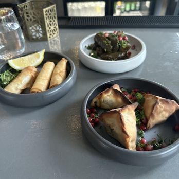 Lira Beirut Eatery - SPINACH FATAYER WARAK ENAB CHEESE ROLLS - Mediterranean Near Me - Miami, Florida