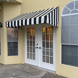 Dismukes Awning Company - Here is one of the awnings Dismukes installed. It's been there for several years. Look how good it still looks.