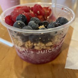 a bowl of fruit and yogurt