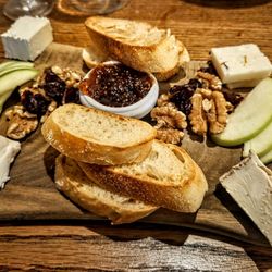 La Belle Epoque Cafe - Plateau de Fromages: Four assorted artisan cheeses complimented with baguette toasts, fig spread, apples, walnuts & dried cranberries. $21