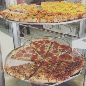 Pazoon's Pizza - a variety of pizzas on display - Pizza Near Me - London, Ontario Pazoon's Pizza - a variety of pizzas on display - Pizza Near Me - London, Ontario