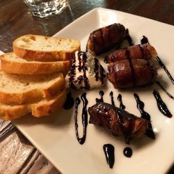 District Wine - Prosciutto wrapped stuffed dates