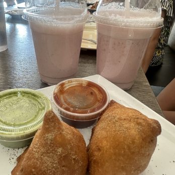 Indian Cafe - Appetizer samosas and Strawberry Lassi and strawberry milk shake. - Indian Near Me - Manteca, California Indian Cafe - Appetizer samosas and Strawberry Lassi and strawberry milk shake. - Indian Near Me - Manteca, California