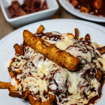 Poutineville - Montrealer Signature Poutine ($16.95) with Smoked Meat on the side - Salad Near Me - Montreal, Quebec