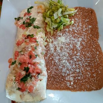 El Rey Azteca Mexican Restaurant - Burrito Gonzalez-steak, chicken, shrimp, chorizo, and fried onions topped with cheese fondue, pico de gallo. Extra beans. no rice - Mexican Near Me - Wilkes-barre Township, Pennsylvania El Rey Azteca Mexican Restaurant - Burrito Gonzalez-steak, chicken, shrimp, chorizo, and fried onions topped with cheese fondue, pico de gallo. Extra beans. no rice - Mexican Near Me - Wilkes-barre Township, Pennsylvania