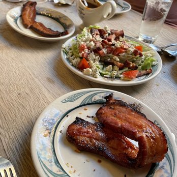 Peter Luger - Chopped Iceberg Wedge Salad and Luger's Sizzling Bacon, Extra Thick by the Slice - Steakhouses Near Me - Brooklyn, New York Peter Luger - Chopped Iceberg Wedge Salad and Luger's Sizzling Bacon, Extra Thick by the Slice - Steakhouses Near Me - Brooklyn, New York