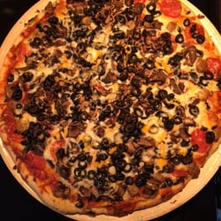 Papa Murphy's - Regular crust pizza with Cowboy topping (red sauce, pepperoni, Italian sausage, mushrooms, black olives, and herb and cheese blend, $15.45.