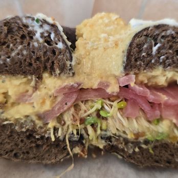 Bagel Cafe - Toasted Rye Bagel with hummus, Sprouts, Pickled Red Onion ruined because it got cut with a knife that left a cream cheese smear - Sandwiches Near Me - Camden, Maine Bagel Cafe - Toasted Rye Bagel with hummus, Sprouts, Pickled Red Onion ruined because it got cut with a knife that left a cream cheese smear - Sandwiches Near Me - Camden, Maine