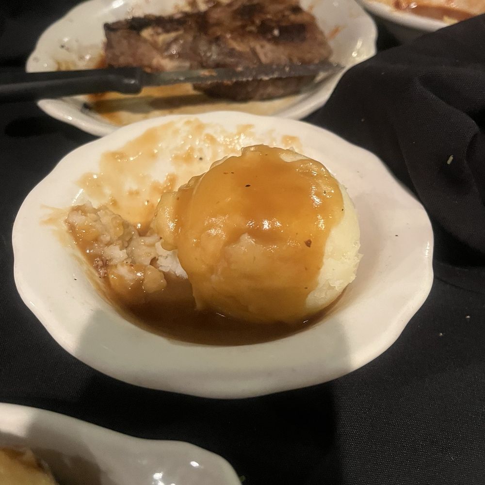 Mashed potatoes and T-bone steak Mashed potatoes and T-bone steak