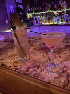 Photo of The Almanett Bistro - Gulfport, MS, US. two cocktails on a bar