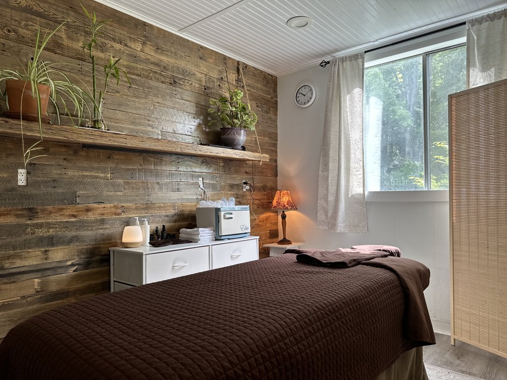 Rooted Intention Massage Logo