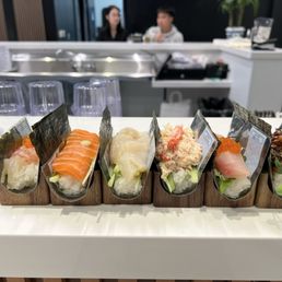 Ama ebi (sweet shrimp), salmon, Hokkaido scallop, snow crab, hamachi, salmon skin