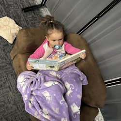 The Children’s Cloud - Enjoying a book