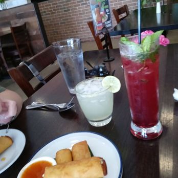 Thai Basil Kitchen - Our drinks pomegranate mojito and margarita with crab ragoon spring rolls - Thai Near Me - Cumming, Georgia