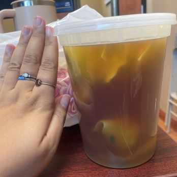 Lucky Express - Wonton soup (hand for size reference) - Chinese Near Me - Boca Raton, Florida