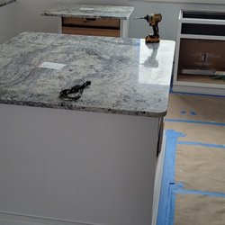 Mid America Granite and Stone - first time with sink in our sink cabinet. they digitally cut for