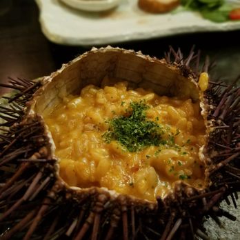 Kinjiro - Uni risotto served inside an uni. $24 - Izakaya Near Me - Los Angeles, California