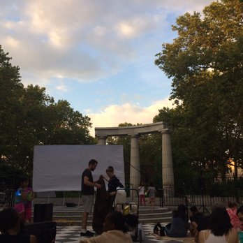 Athens Square Park - Waiting to watch a summer film in Athens Sq park - Parks Near Me - Astoria, New York Athens Square Park - Waiting to watch a summer film in Athens Sq park - Parks Near Me - Astoria, New York
